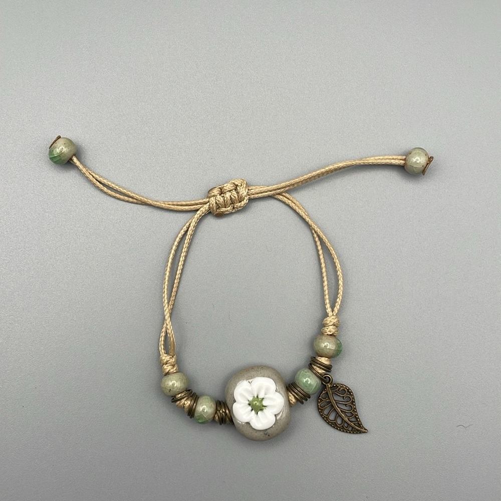 Green and Tan Bohemian Bracelet with Charms - Picture 2 of 6